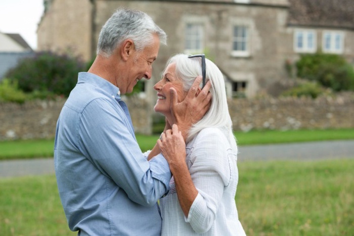 Adorable senior couple looking at each other in an affectionate way