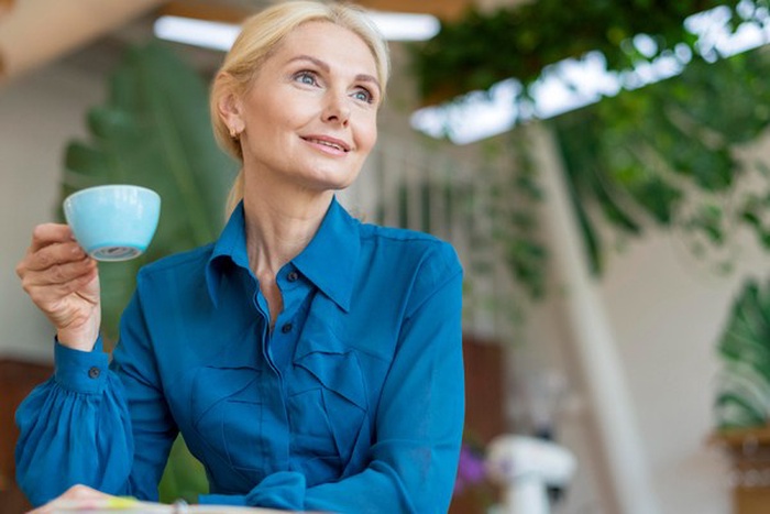 Low angle of older business woman