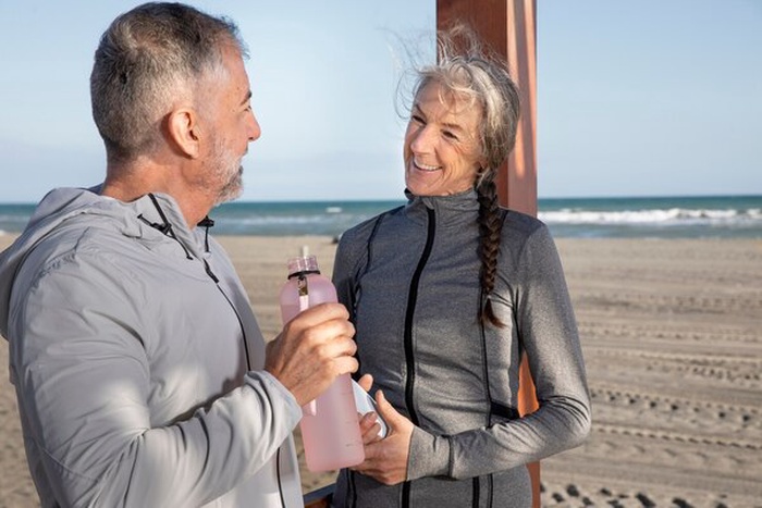 Medium shot senior people at beach