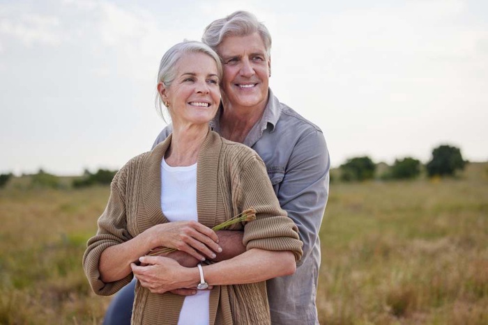 Love hug and happy with old couple in nature
