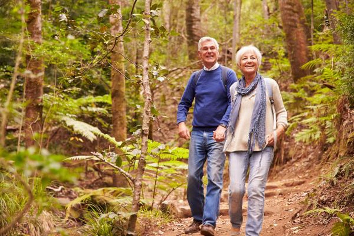 mature couple walking Catoctin mountain trail Thurmont Maryland