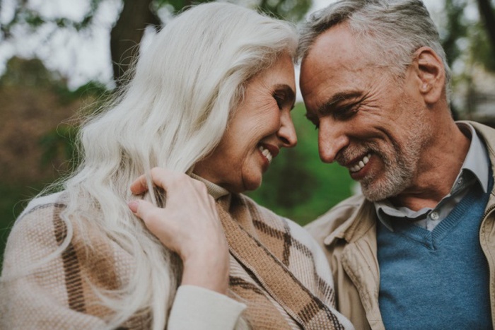 Portrait of couple with friends