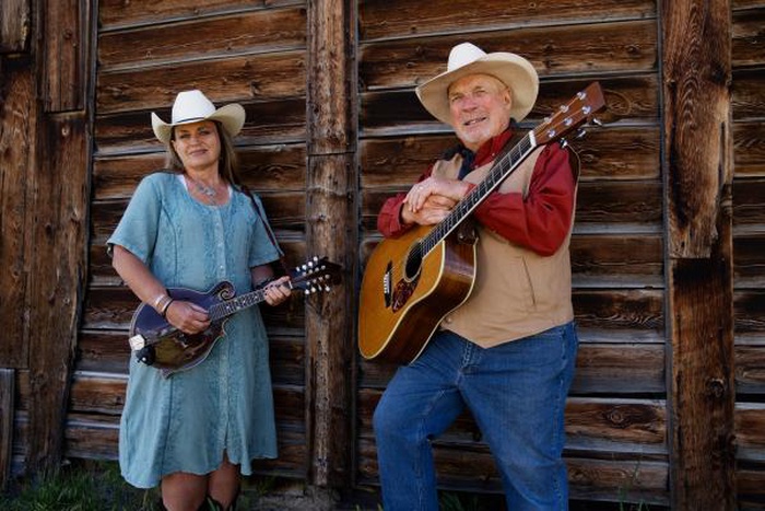 Senior couple playing country music on a casual date