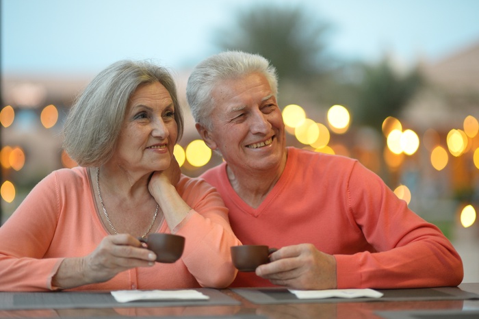 Portrait of amusing old couple on vacation