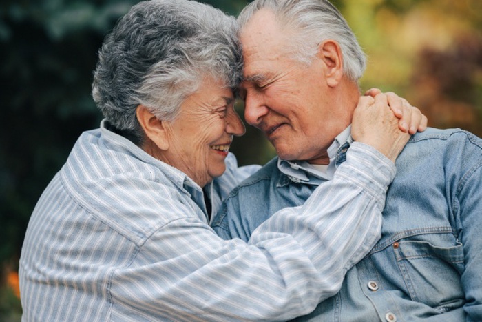 Beautiful old couple spent time together in a park