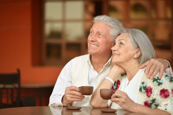 Smiling mature couple at home
