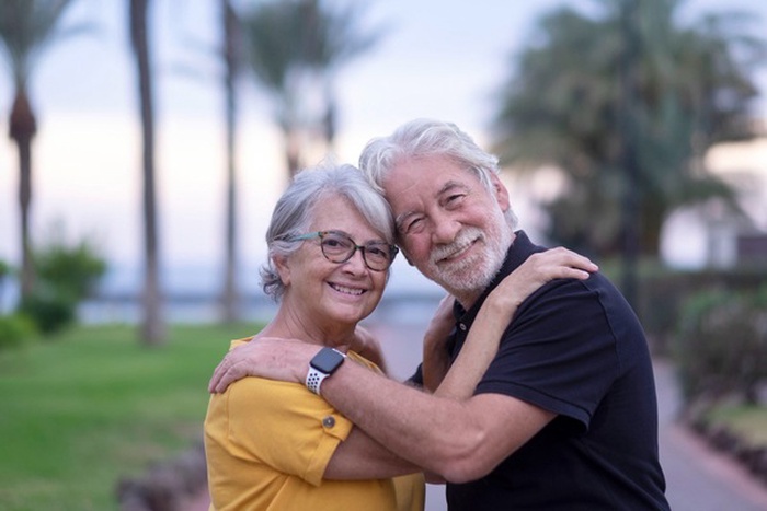 Portrait of two senior people smiling happily
