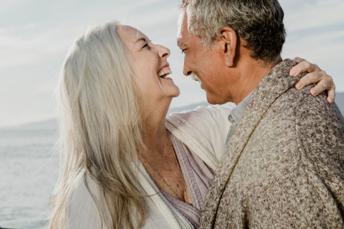 Cheerful senior couple dancing on santa monica pier