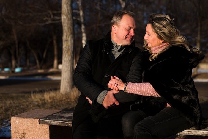 romantic seniors looking each other
