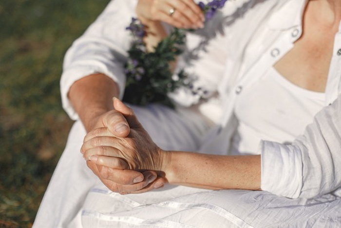 Senior man and woman in the mountains