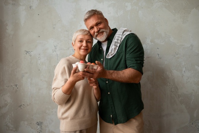 Smiling mature couple at home