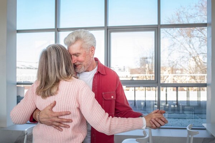senior couple dancing together