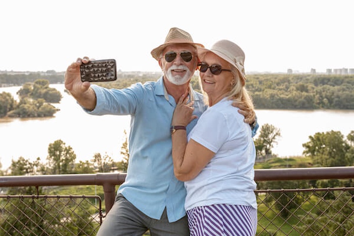 Cute senior couple taking a selfie
