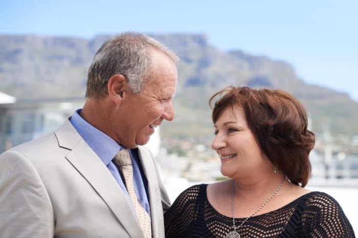 Love happy and business with mature couple in real estate agency for partnership consultant and entrepreneur venture smile teamwork and collaboration with senior man and woman in startup company