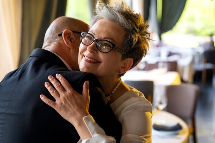 Couple having a date together at a luxurious restaurant