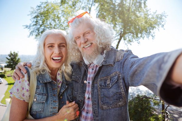 Happy elderly couple smiling