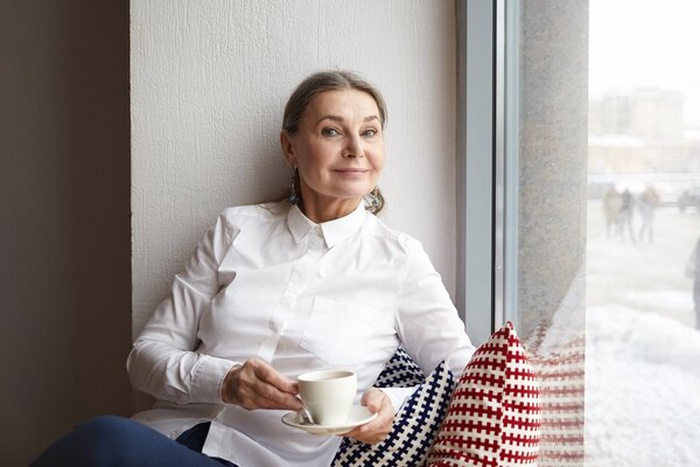 Portrait of attractive elegant mature Caucasian woman
