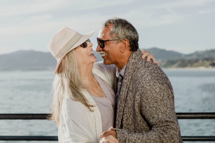 Cheerful senior couple dancing on Santa Monica Pier