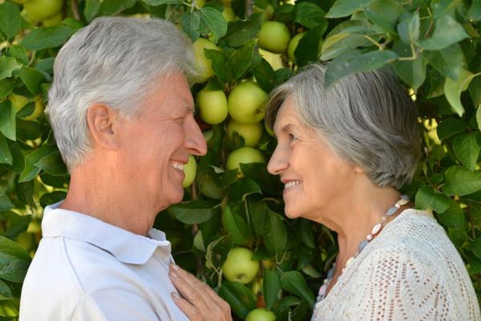Mature couple together for a summer walk