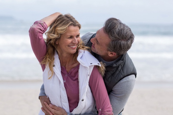  Mature couple enjoying on the beach
