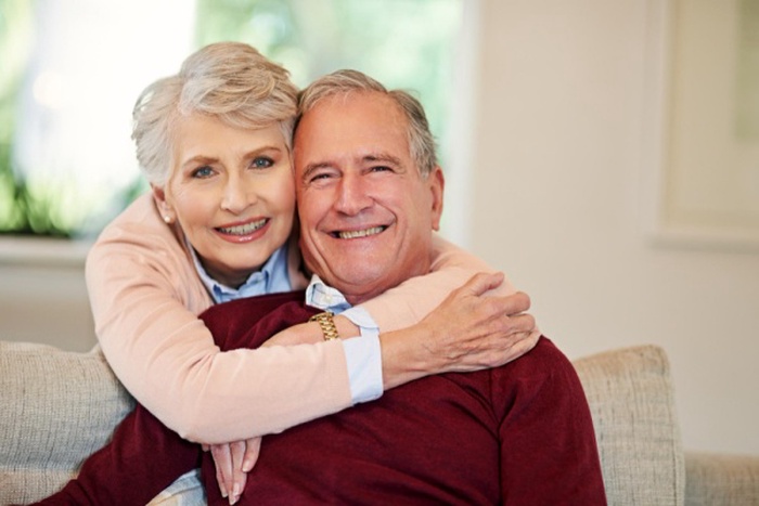 Everything is better when were together shot of a senior woman embracing her husband from behind