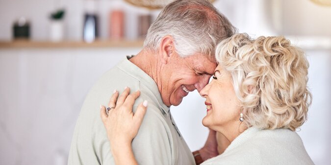 Happy love and face of senior couple dance