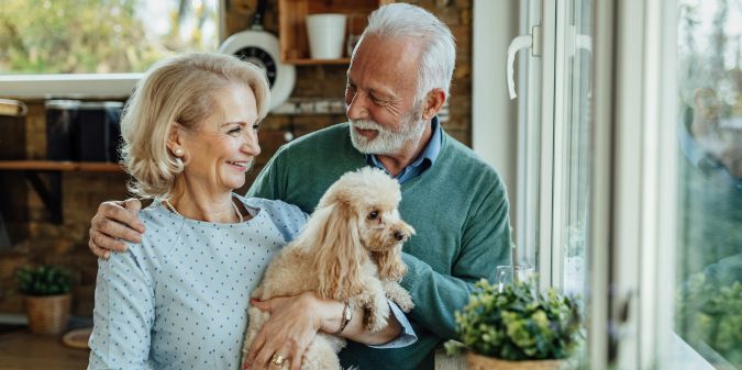 Senior couple with their dog