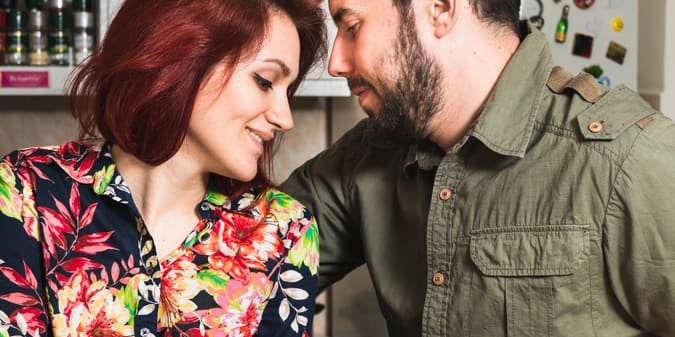 Close-up of a senior couple with cup of coffee