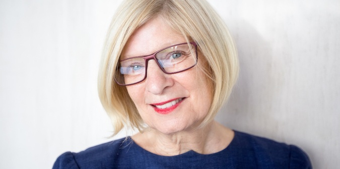 Cheerful senior woman looking at camera