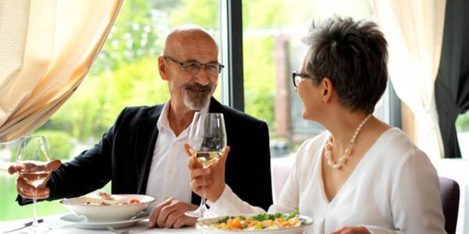 Senior couple having a date together at a luxurious restaurant