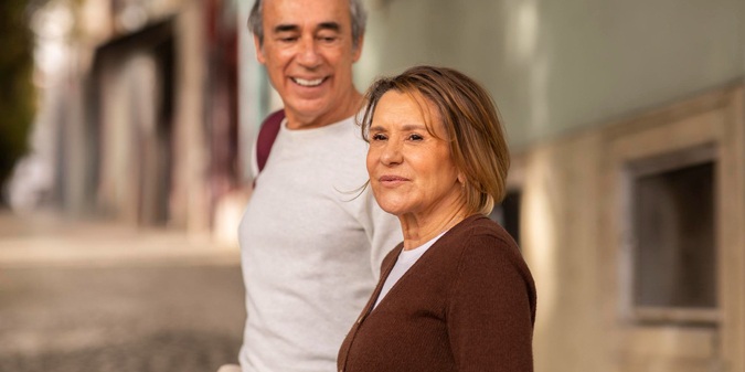 senior tourists couple walking outdoors