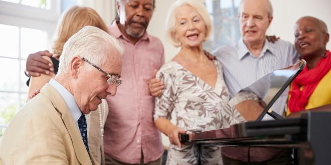 Senior adults enjoying community social event together