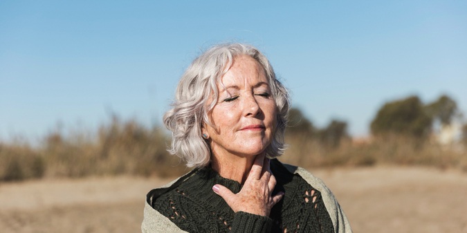 Lovely senior woman posing medium shot