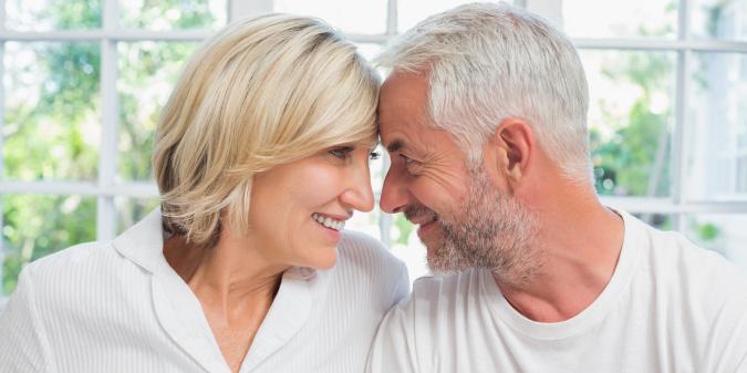 deep eye contact between mature lovers