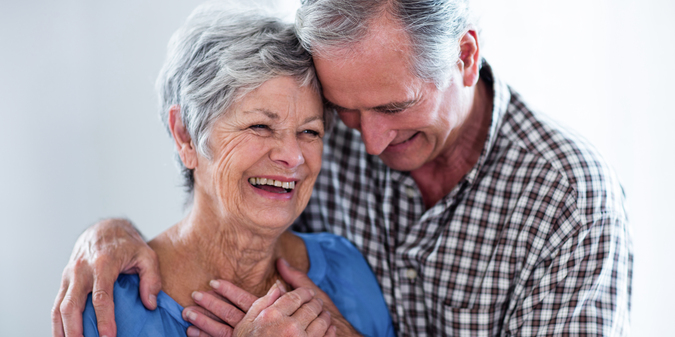 happy-senior-couple-smiling-while-embracing