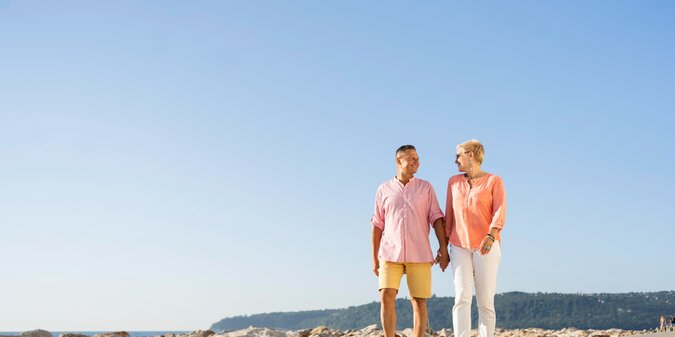 full shot couple walking together