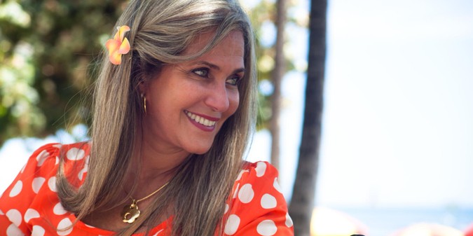 Close-up of smiling woman looking away