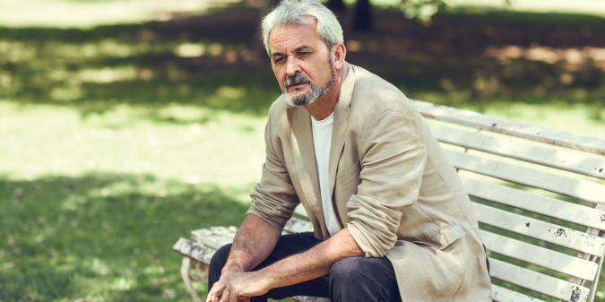 Senior man looking thoughtful hopeful about love again