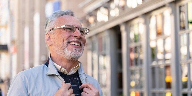 Medium shot happy old man outdoors