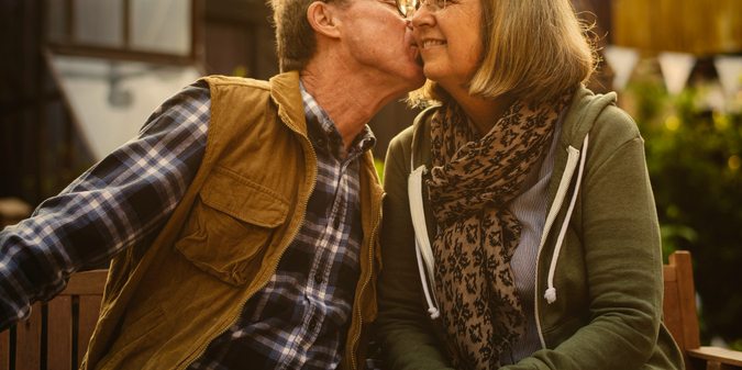 Happy senior couple in their garden