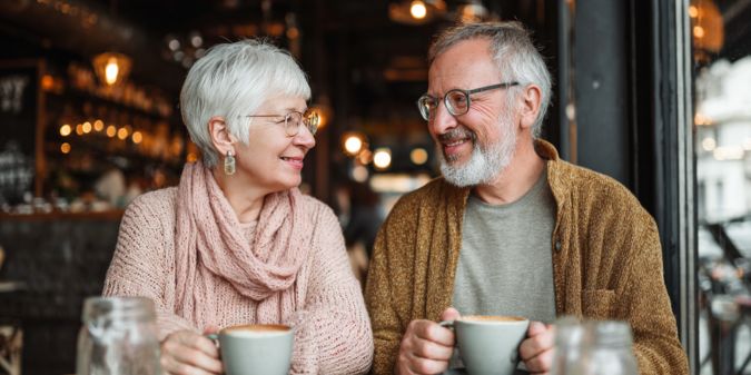 Happy over-50 couple on a cafe 