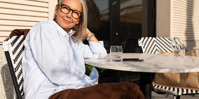 a charming slender mature woman