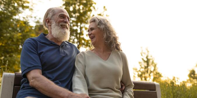 shot senior couple on bench