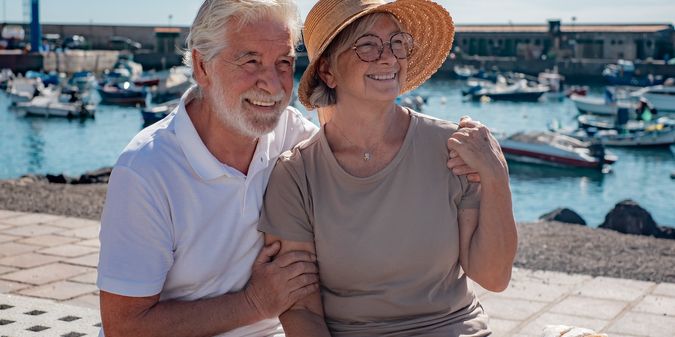 senior family couple hugging cuddling sitting together