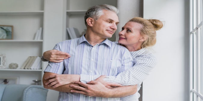 Honest mature couple smiling