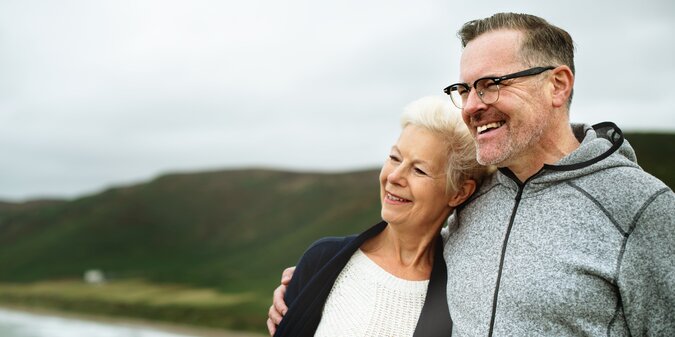 A scenic photo of a happy elderly couple.