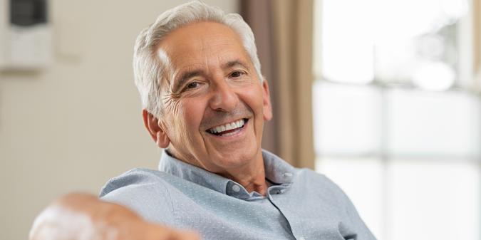 Happy senior man smiling finding love at 70