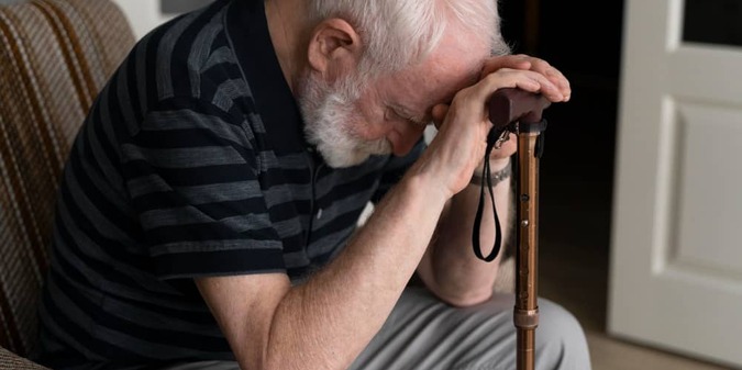 Senior man confronting alzheimer disease