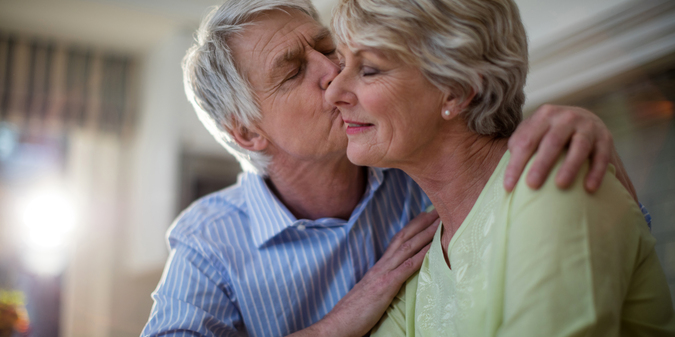 senior-man-kissing-senior-woman