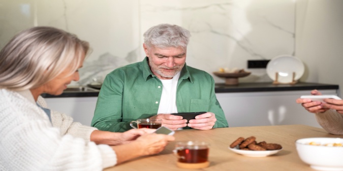 Senior couple connecting online